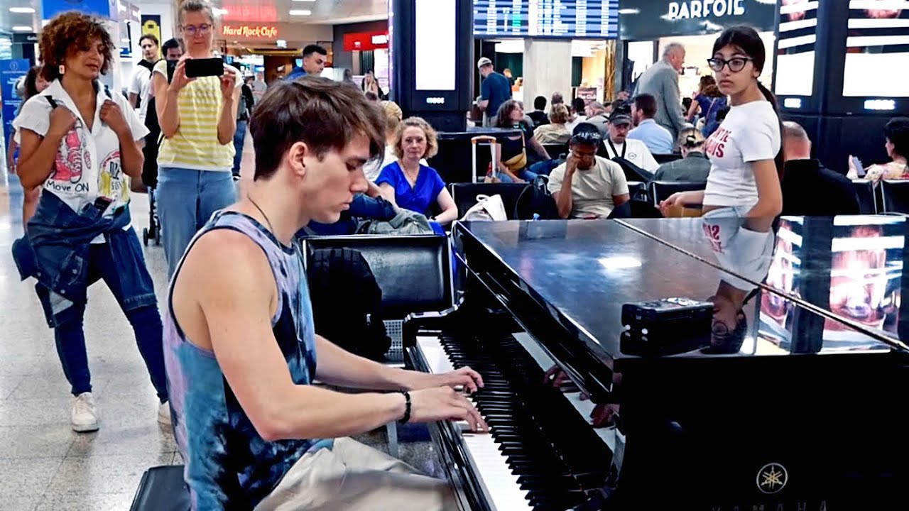 Peter Buka: A Pianist Played 'Fix You' at a Busy Airport and the Terminal Went Silent